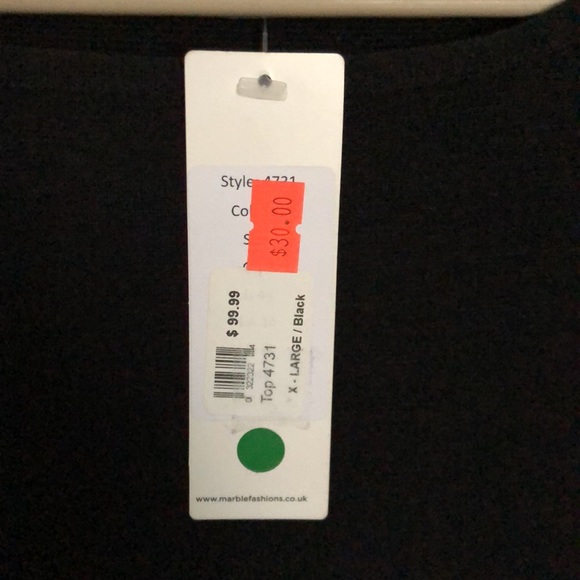 Sweater with open slots down the button sleeves. - Picture 5 of 5